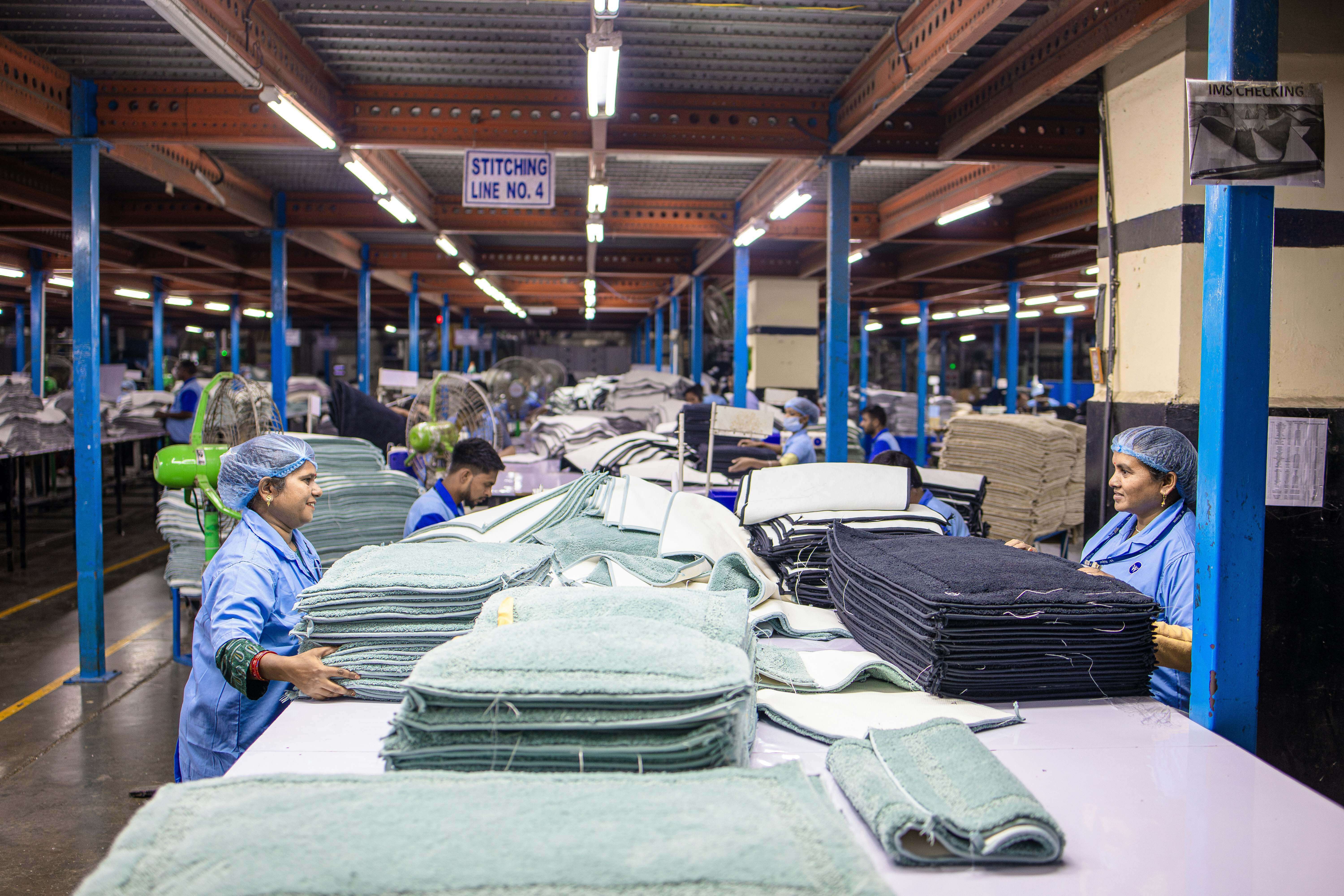 knitwear manufacturer 2026 production facility sorting yarn
